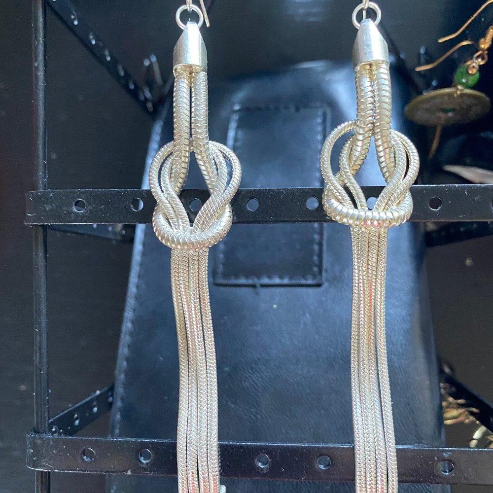 Long and luxurious silver-toned "rope" earrings